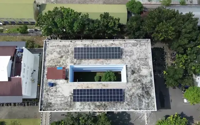 Drone photo: two solar arrays on a flat roof